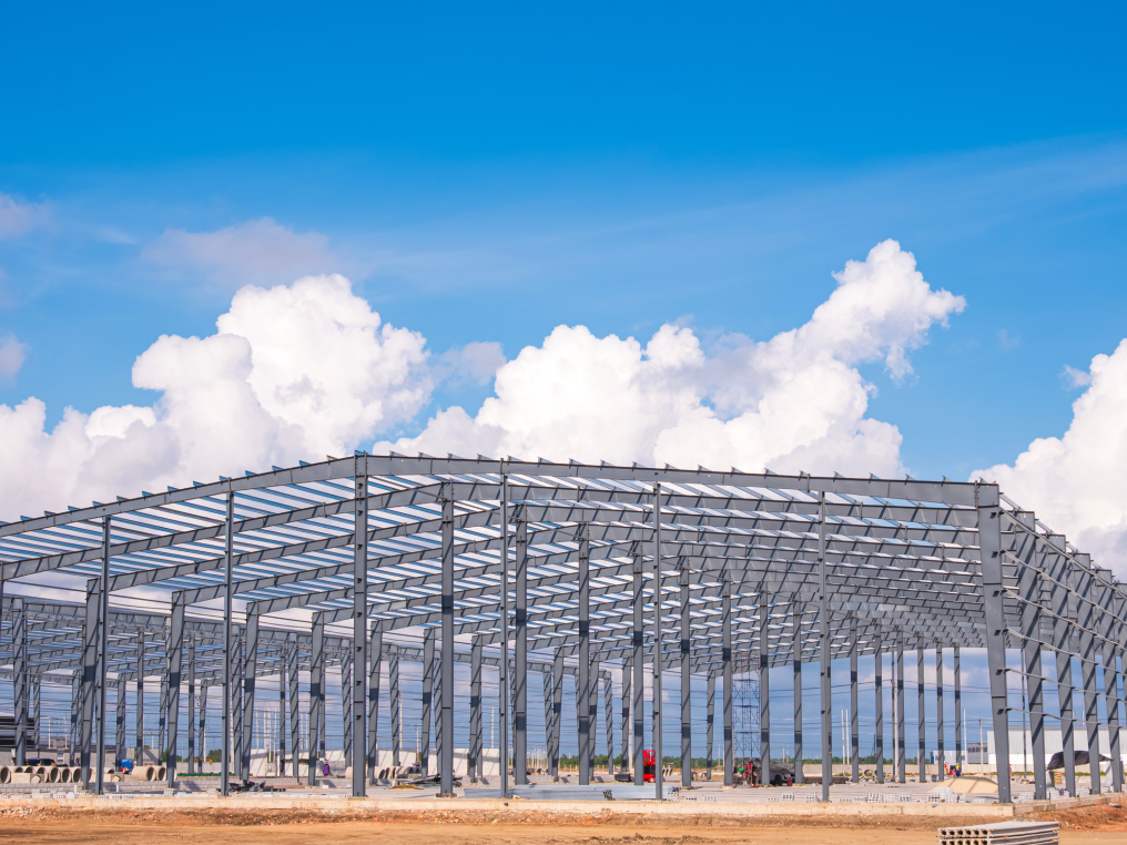 Worker moving through warehouse racking